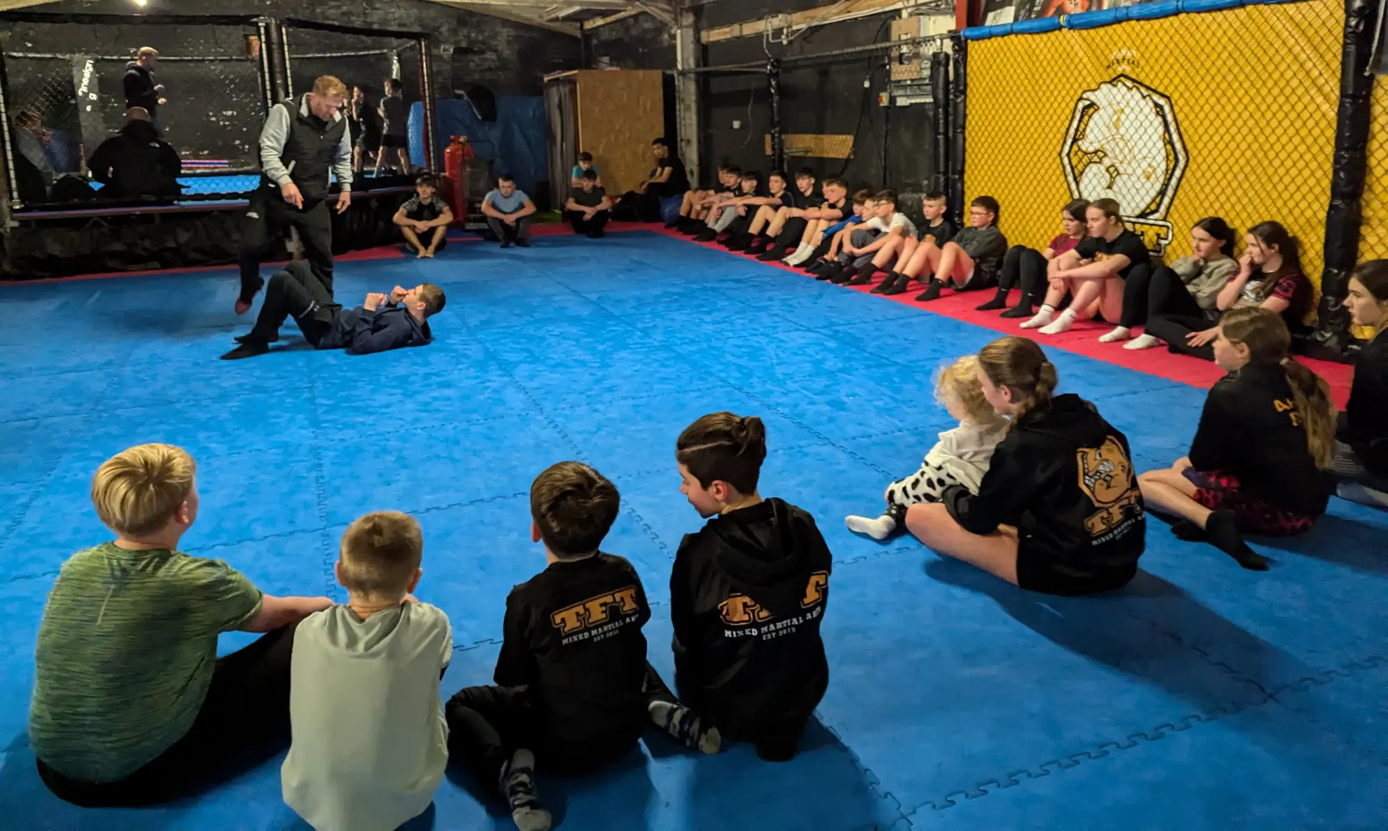 Teen members learning MMA skills at TFT MMA