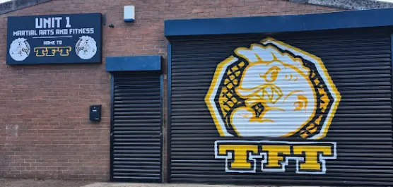 The TFT MMA entrance and fish logo on Strangford Road in Seaham